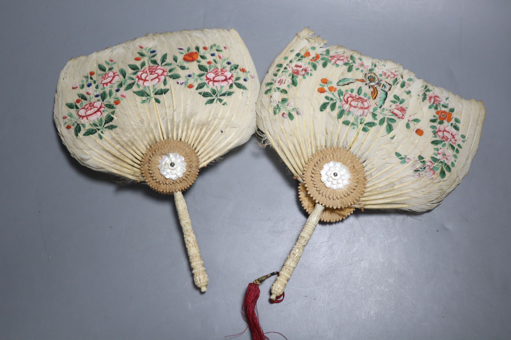 Two Chinese ivory handled painted feather fans, 19th century, length 28cm